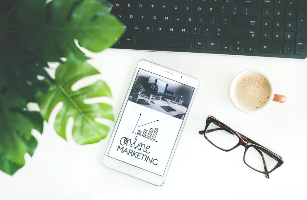 graphic depicting glasses, a mug and a keyboard